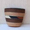 CHINDU African Sisal woven planters are handmade using sisal fibre and banana leaves. Dimensions: Small planter: 8 by 8 inches DHL Express shipping which takes 3-5 days to be delivered. Shipping cost calculated during checkout.