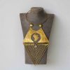 KITI African brass necklace that is elegant to wear and compliments any outfit.