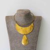 KAMENE African Brass necklace serves as a multipurpose necklace and compliments any outfit.
